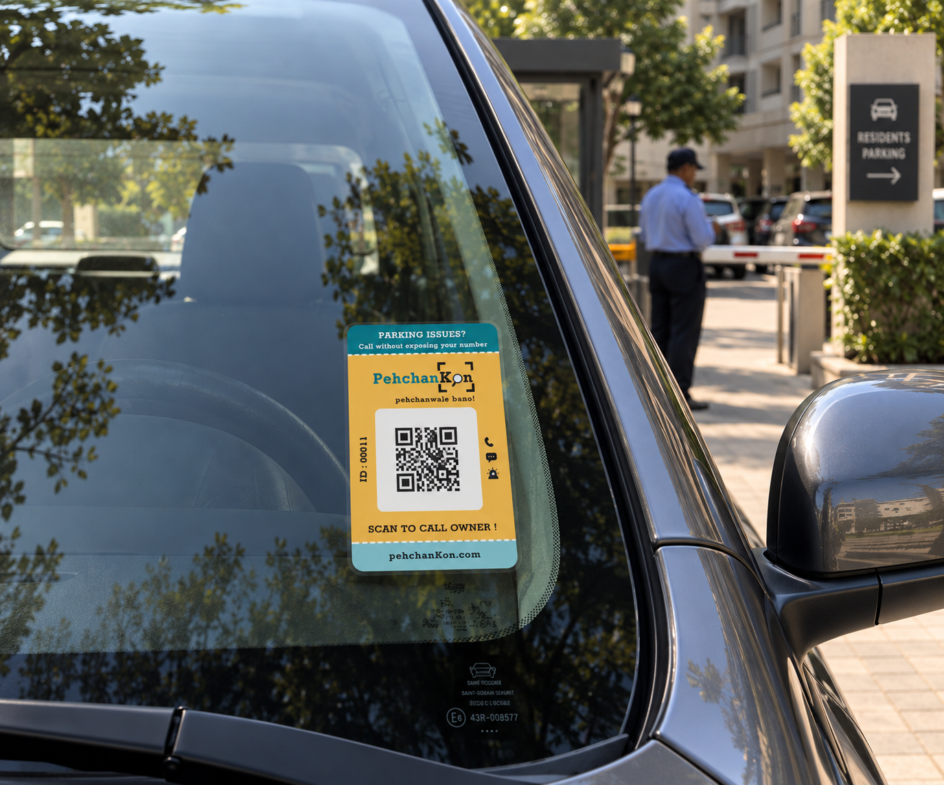 PehchanKon QR sticker on a car windshield